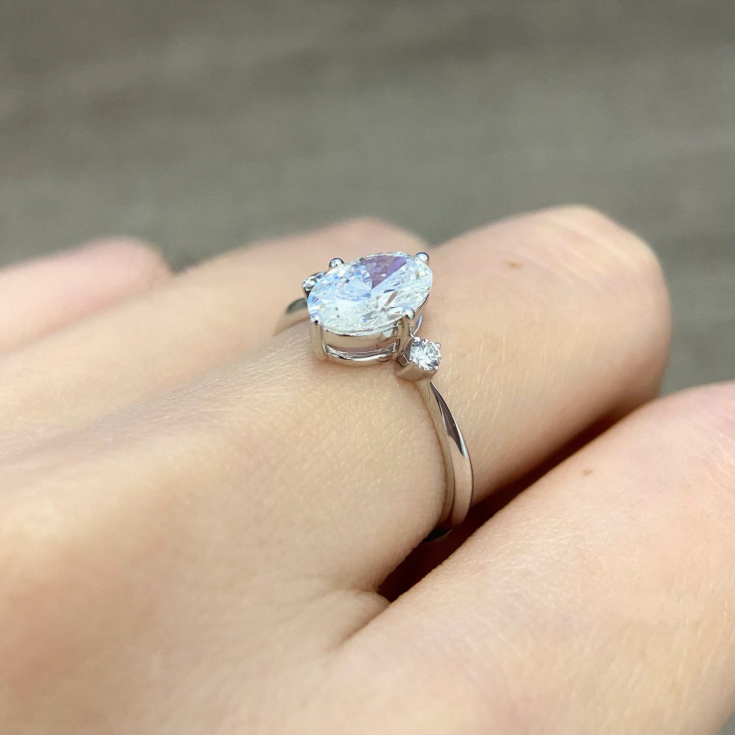 Oval cut CVD diamond three stone style engagement ring