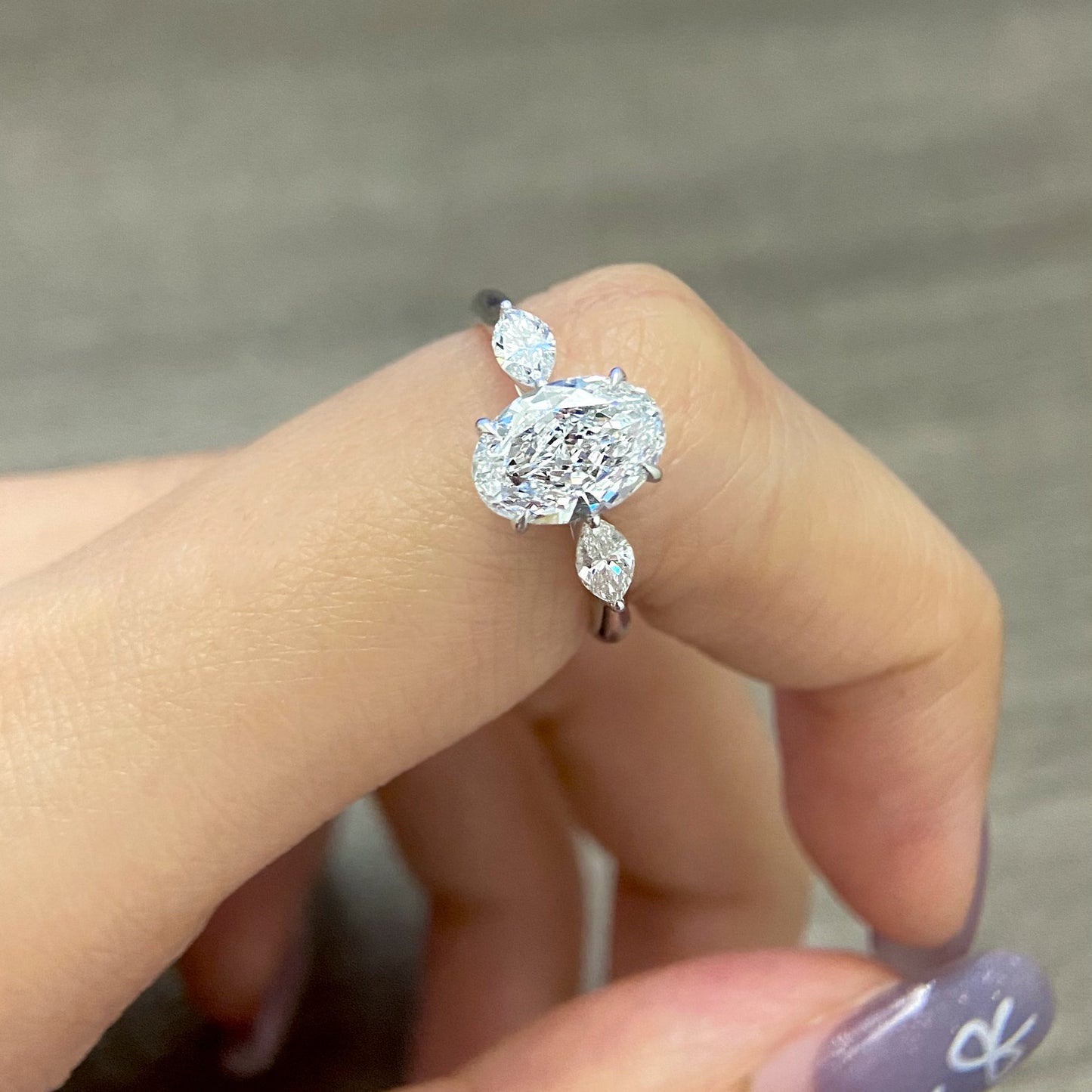 Oval cut CVD diamond three stone style engagement ring