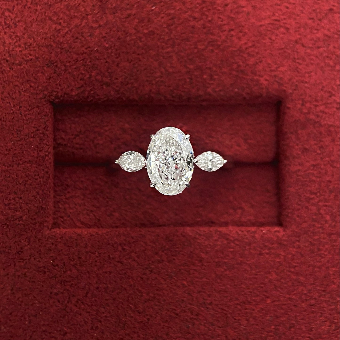 Oval cut CVD diamond three stone style engagement ring