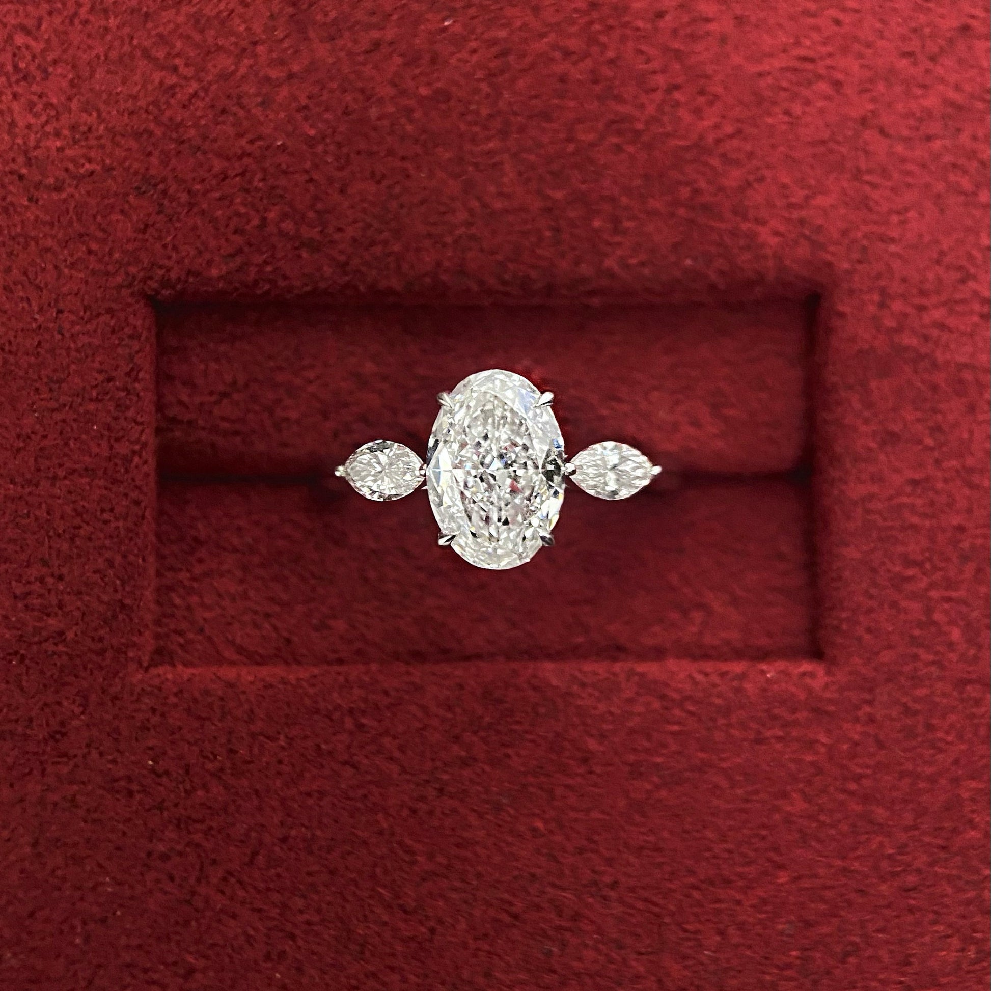 Oval cut CVD diamond three stone style engagement ring