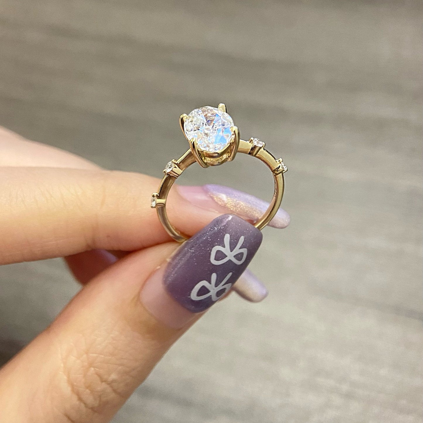 Oval CVD diamond dainty setting engagement ring