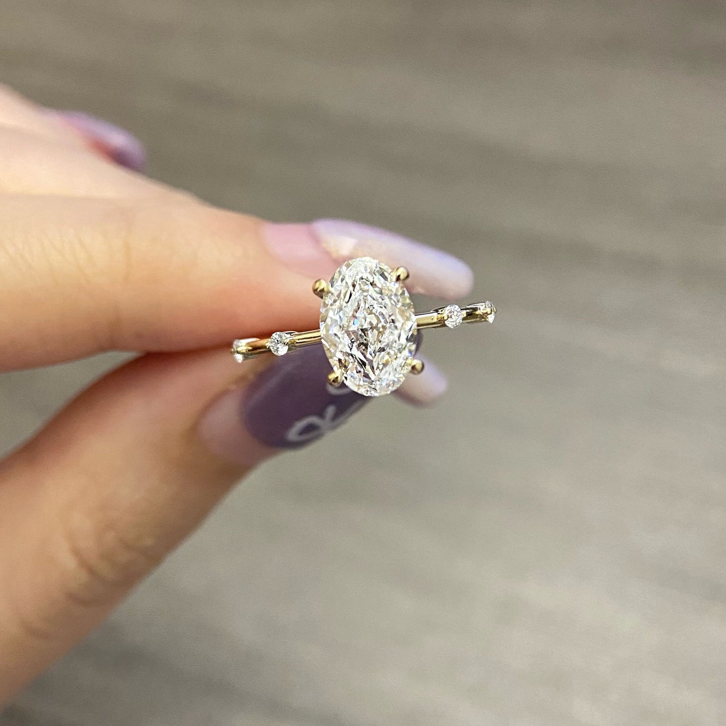 Oval CVD diamond dainty setting engagement ring