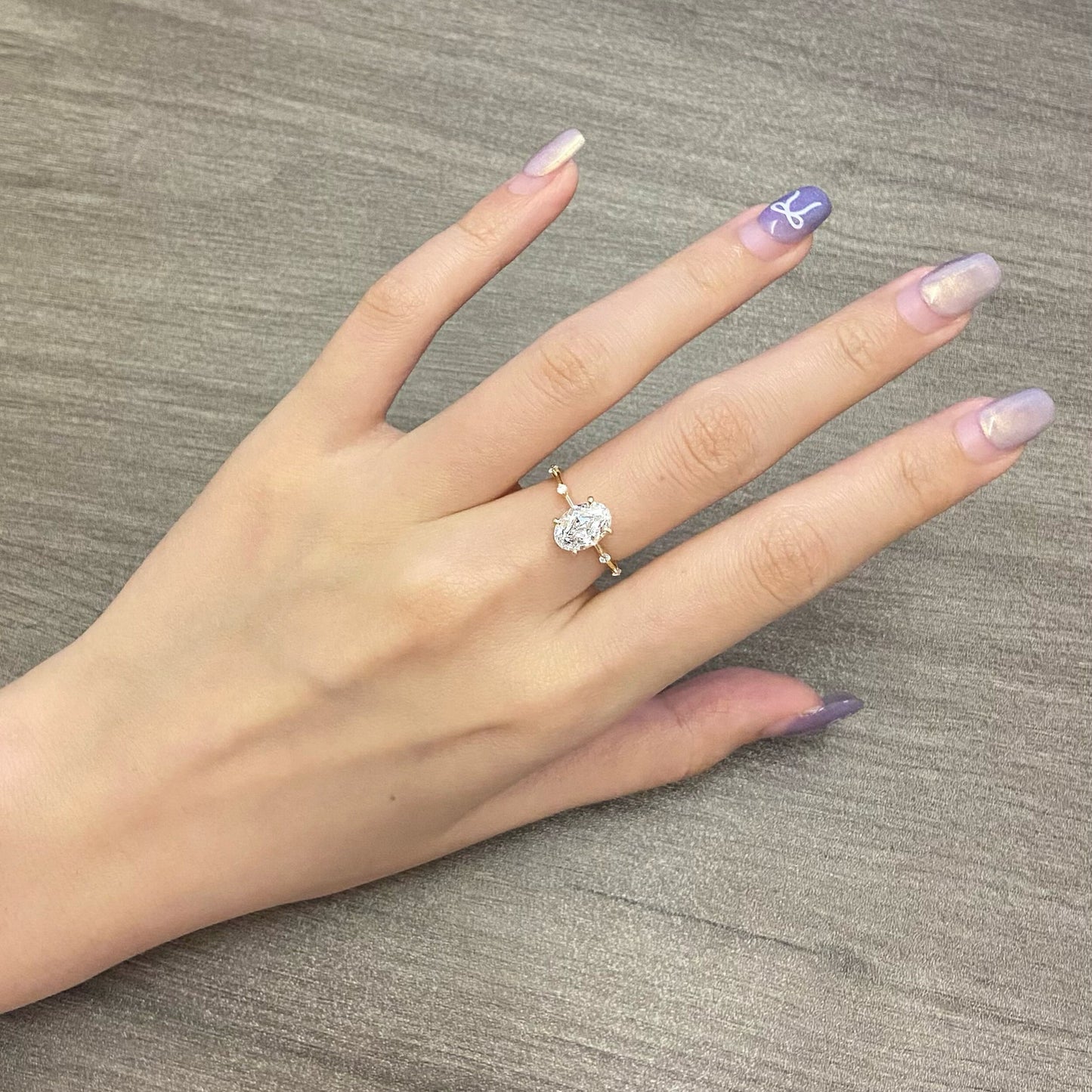 Oval CVD diamond dainty setting engagement ring