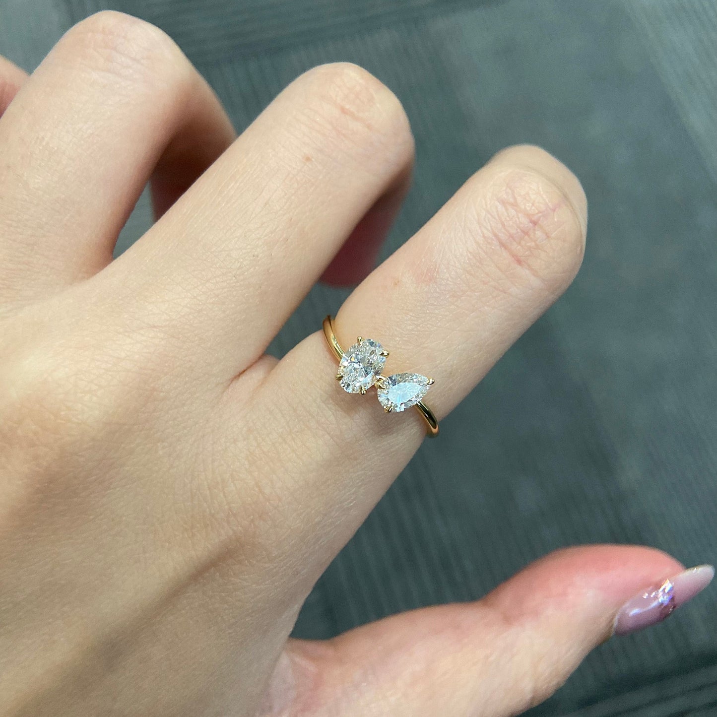 Oval and pear cut CVD diamond two stone style engagement ring