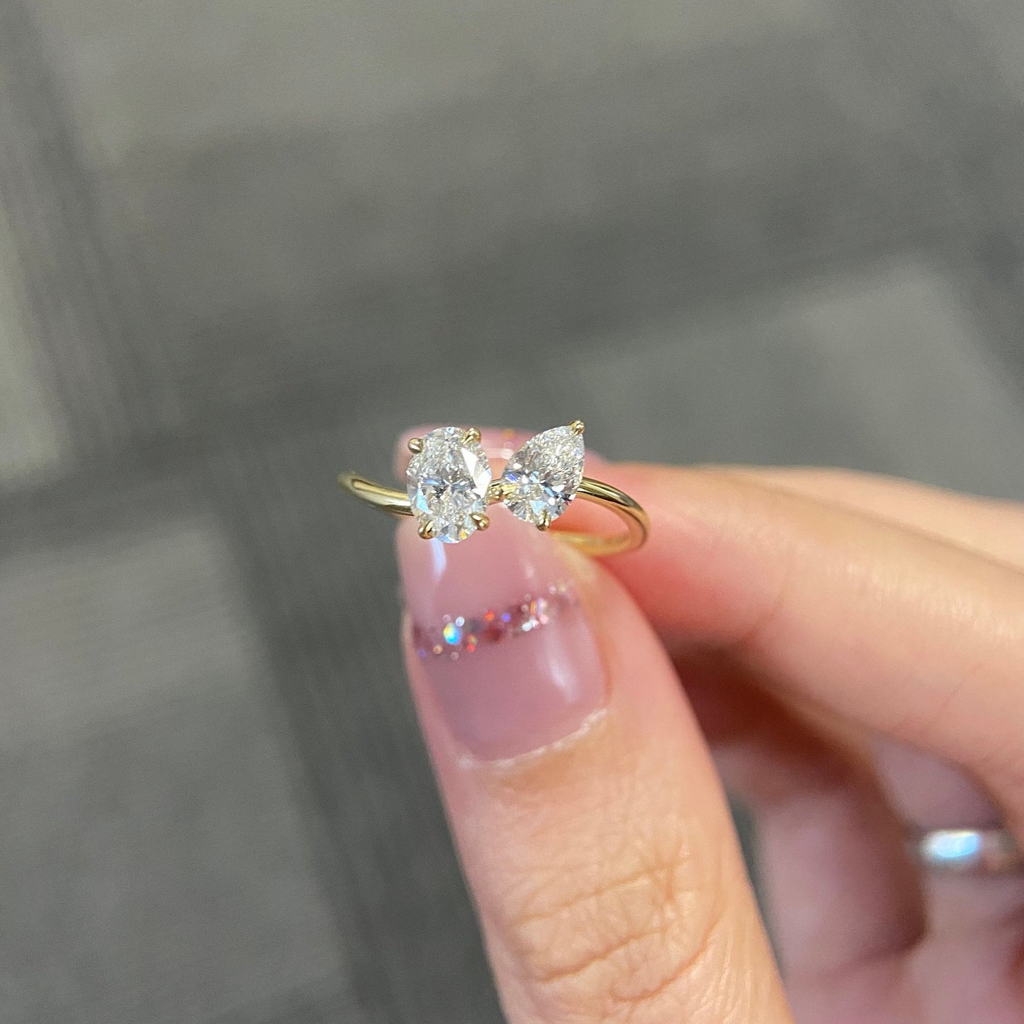 Oval and pear cut CVD diamond two stone style engagement ring