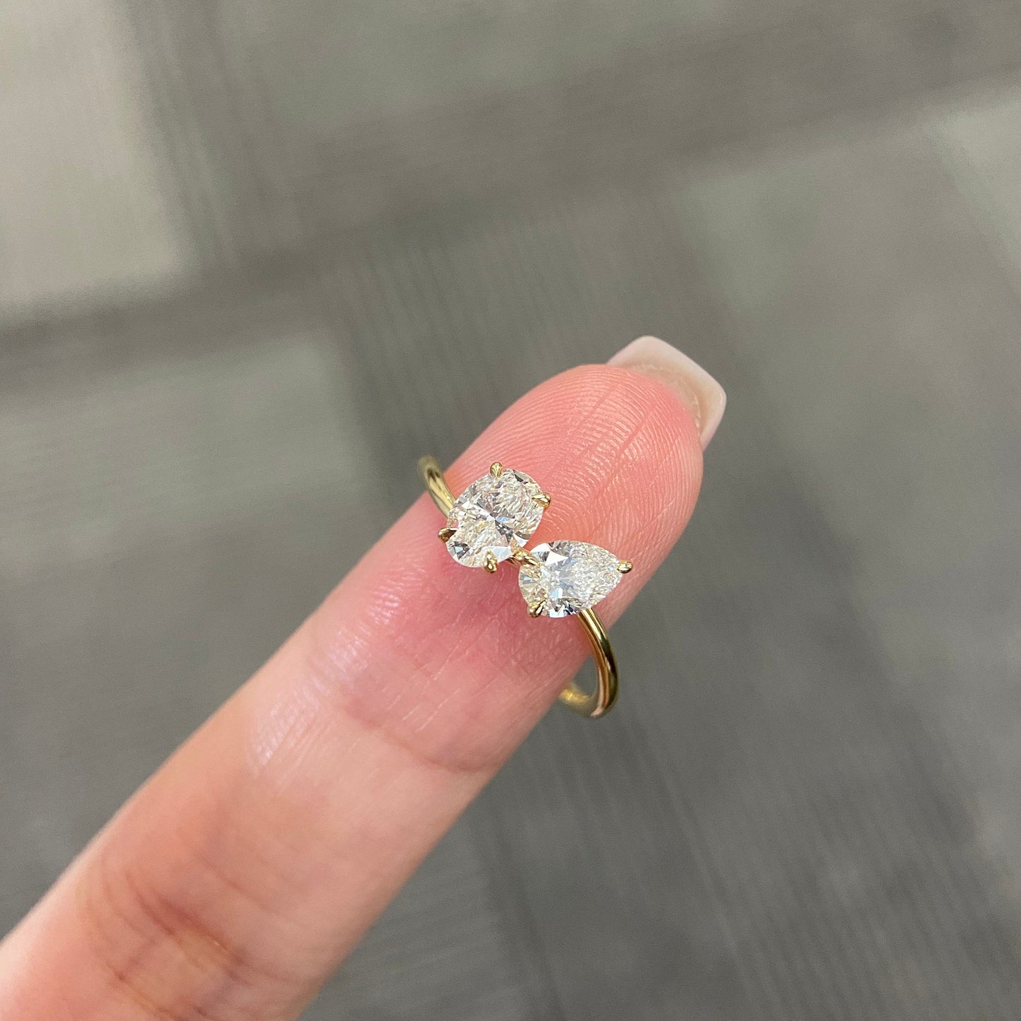 Oval and pear cut CVD diamond two stone style engagement ring