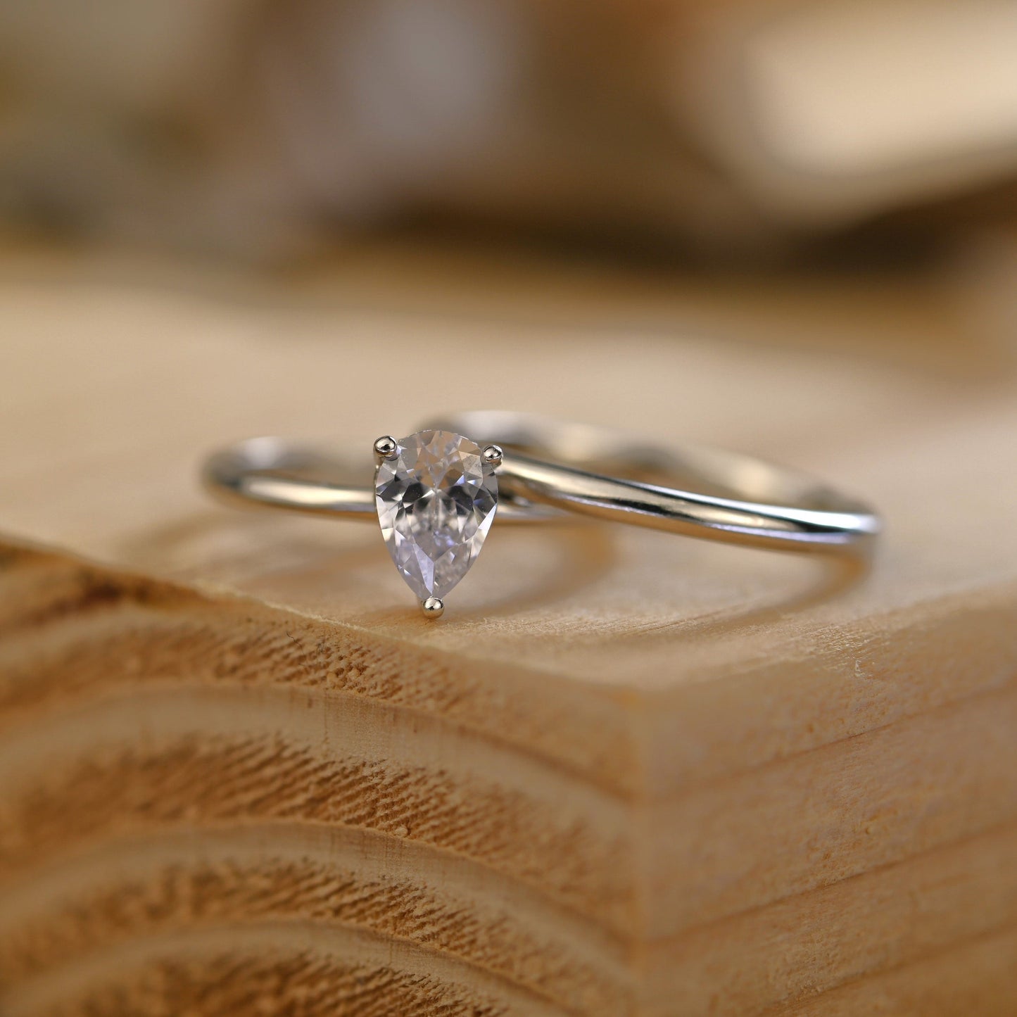 Hidden Halo Bridal Ring Set with 0.75 CT Pear Cut Moissanite