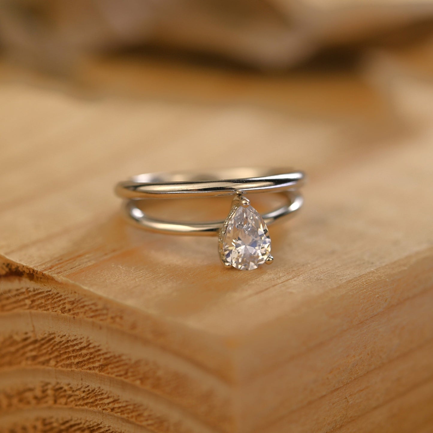 Hidden Halo Bridal Ring Set with 0.75 CT Pear Cut Moissanite