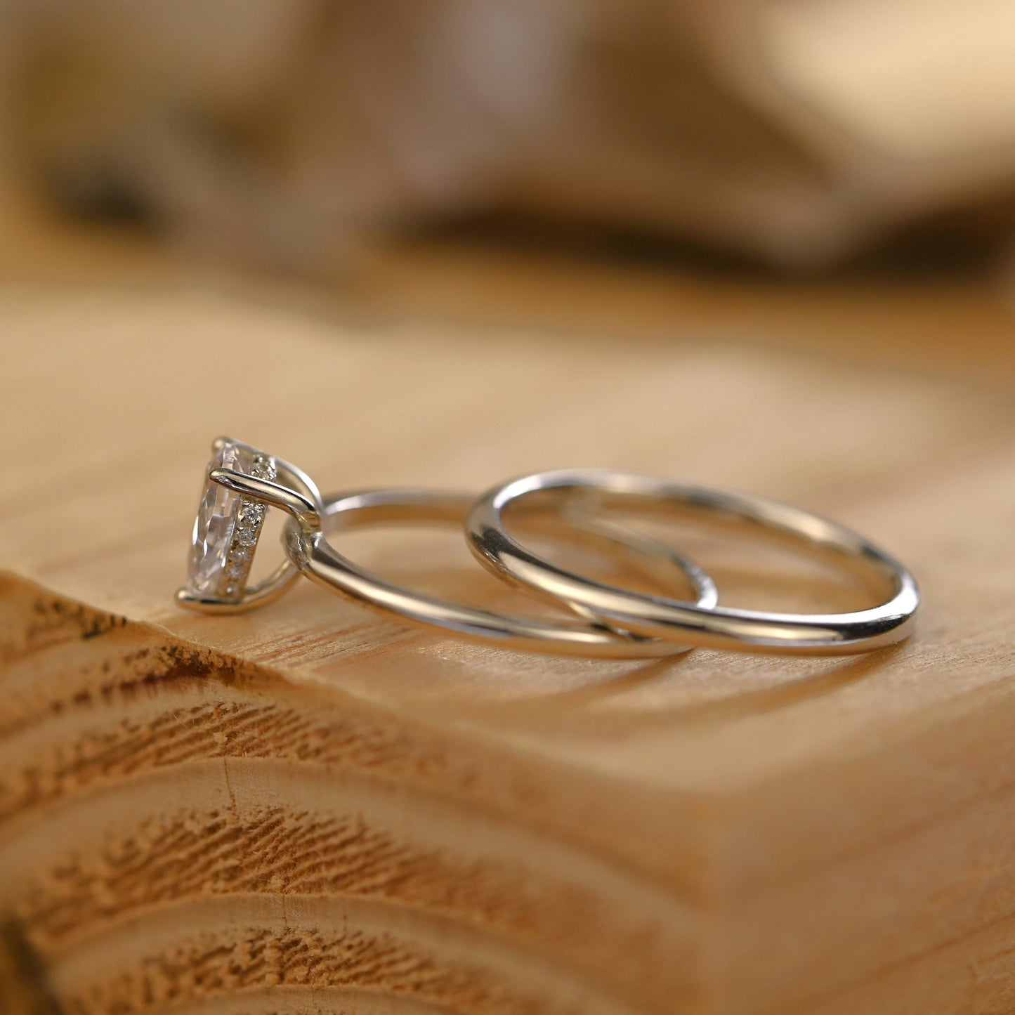 Hidden Halo Bridal Ring Set with 0.75 CT Pear Cut Moissanite