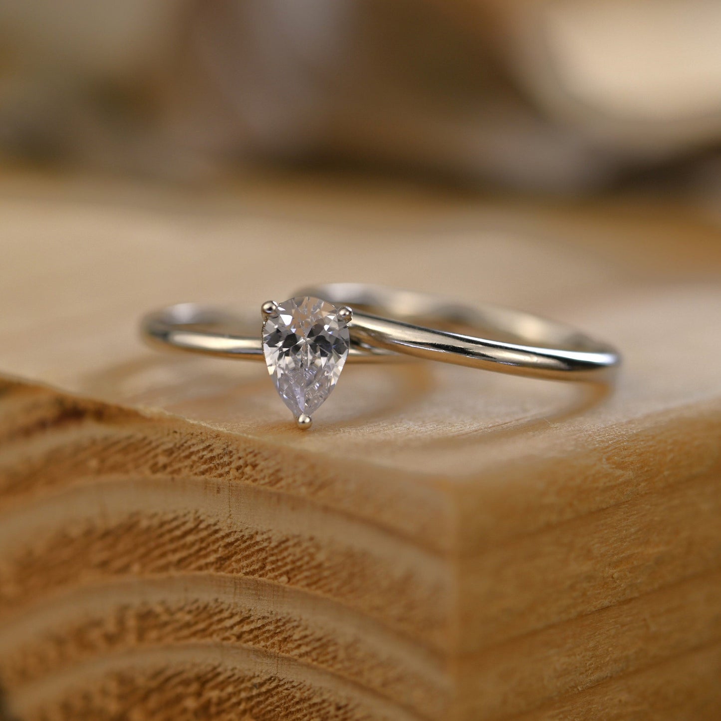 Hidden Halo Bridal Ring Set with 0.75 CT Pear Cut Moissanite