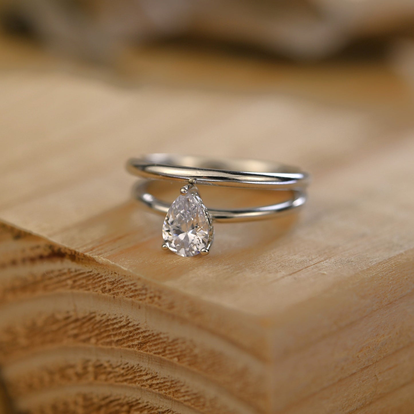 Hidden Halo Bridal Ring Set with 0.75 CT Pear Cut Moissanite