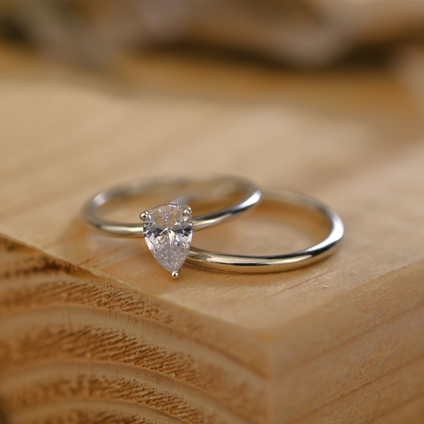 Hidden Halo Bridal Ring Set with 0.75 CT Pear Cut Moissanite
