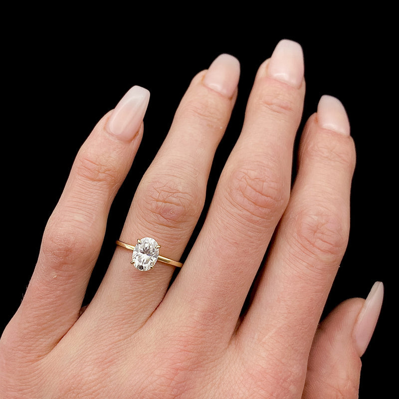 Solitaire Ring with 1.50 CT Oval Cut Moissanite