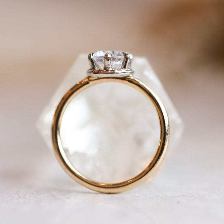 Solitaire engagement ring with round cut moissanite stone