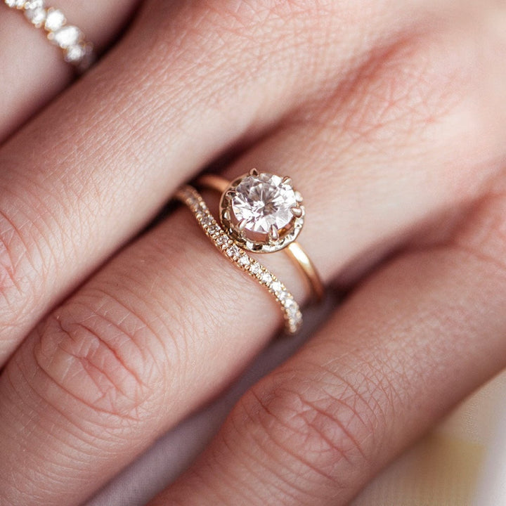 Solitaire engagement ring with round cut moissanite stone
