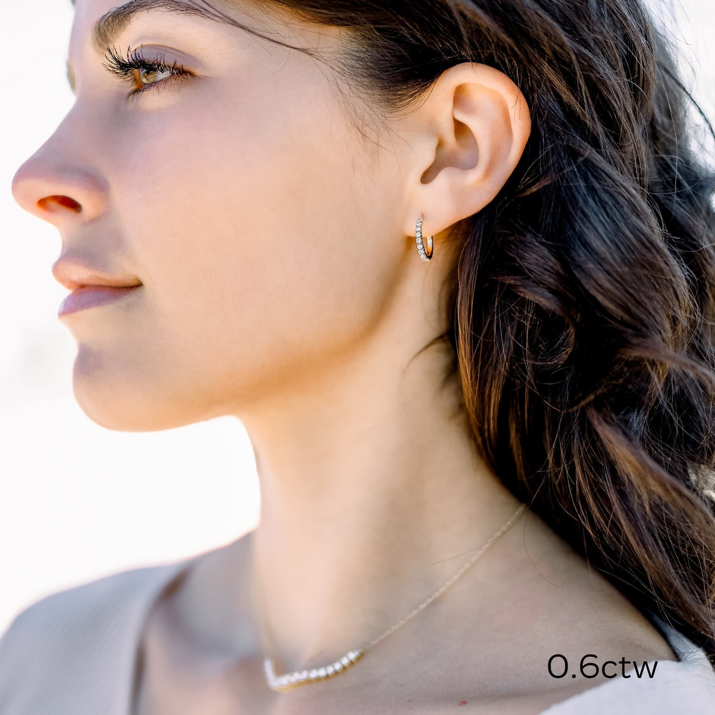 Huggie Hoop Earrings with 0.63 TCW Round Cut Moissanite