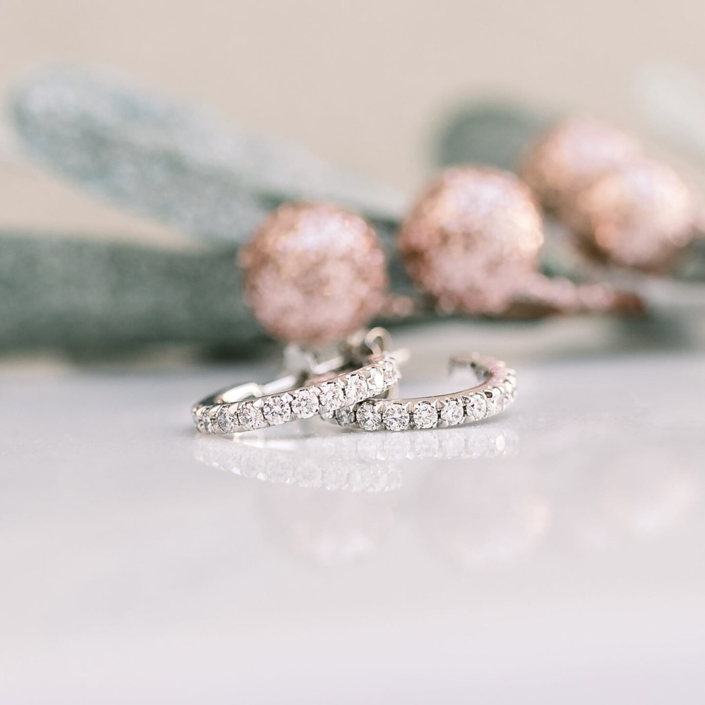 Huggie Hoop Earrings with 0.63 TCW Round Cut Moissanite