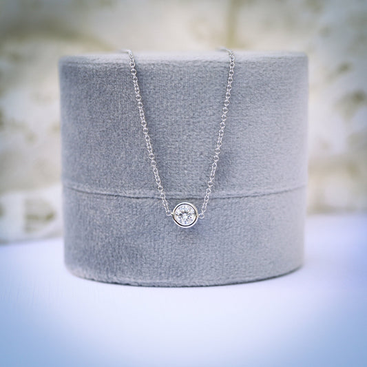 Single Bezel Necklace with 0.10 TCW Floating Cosmopolitan Round Cut Moissanite