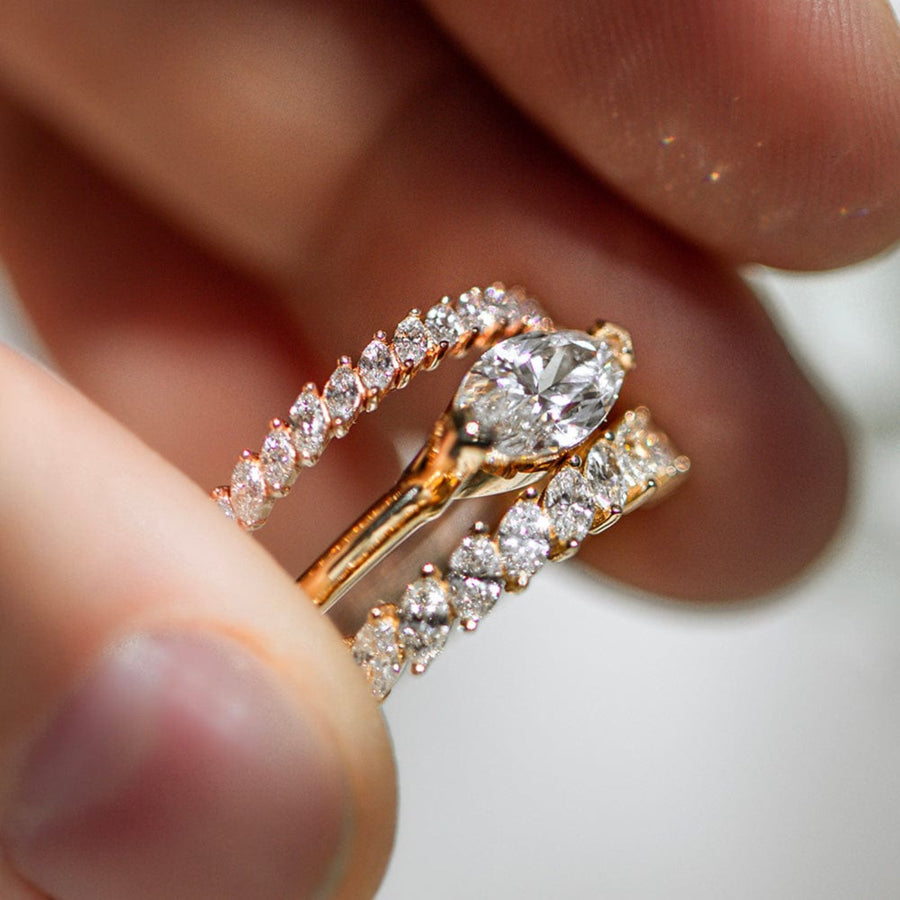 East-west solitaire engagement ring with marquise cut moissanite