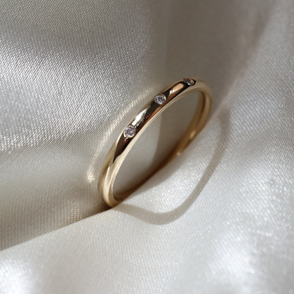 Flush Band with 0.010 TCW Round Cut Moissanite