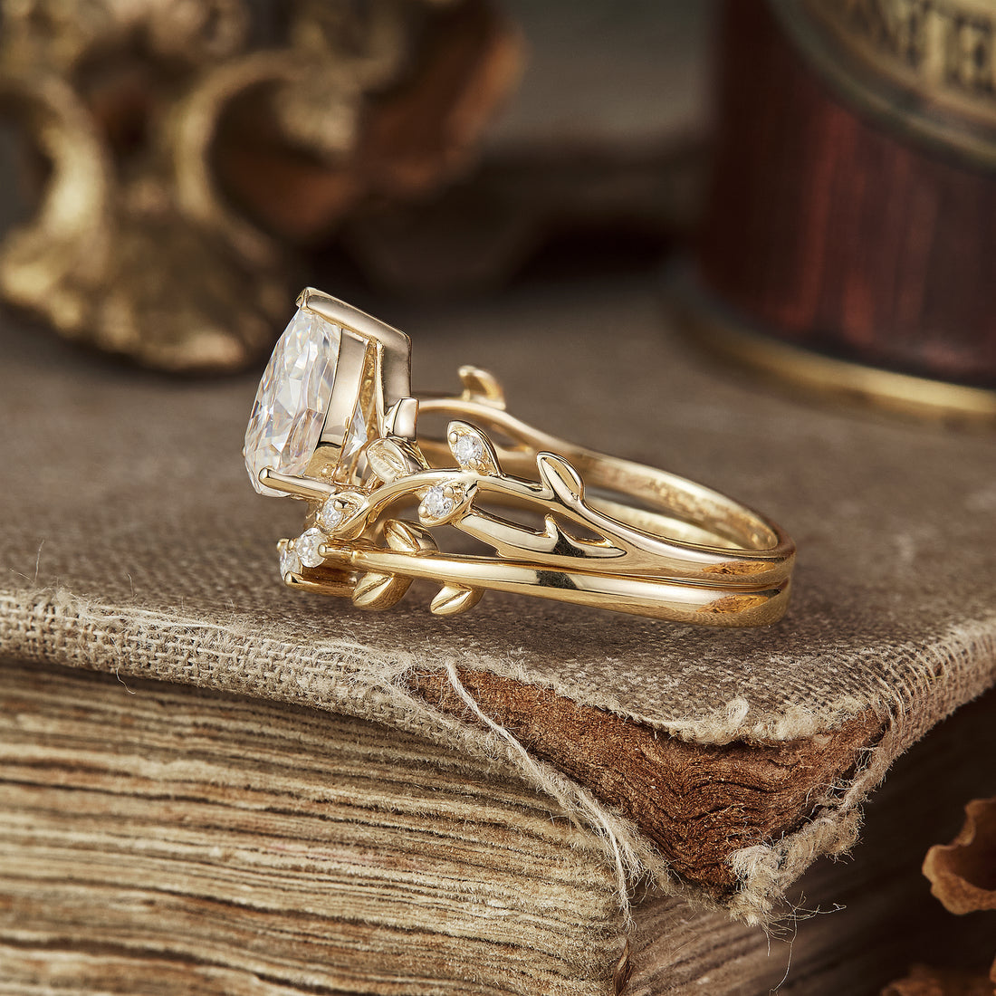 Pear shaped moissanite diamond bridal set with vintage setting