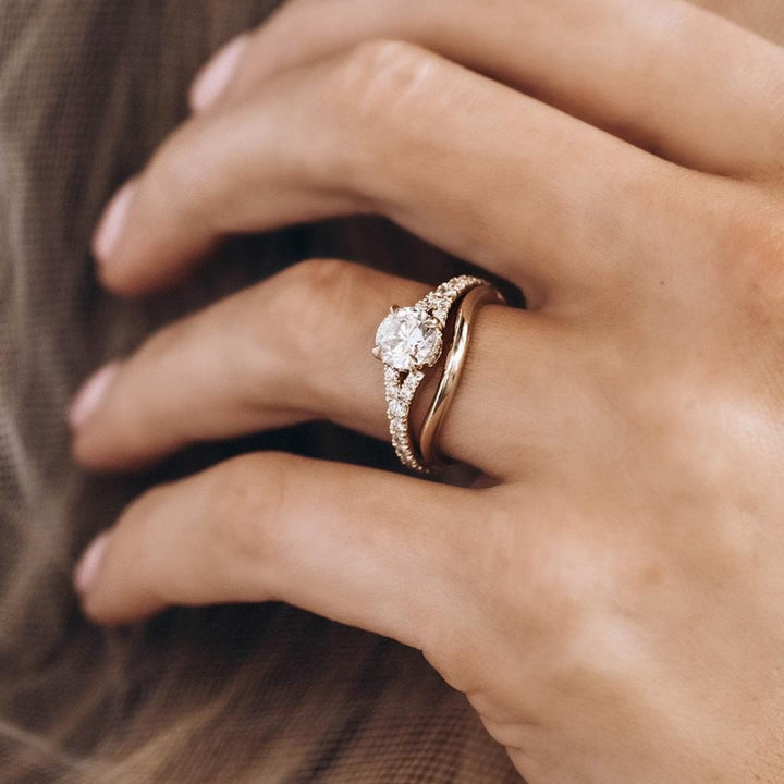 Round moissanite split shank pave engagement ring with brilliant sparkle