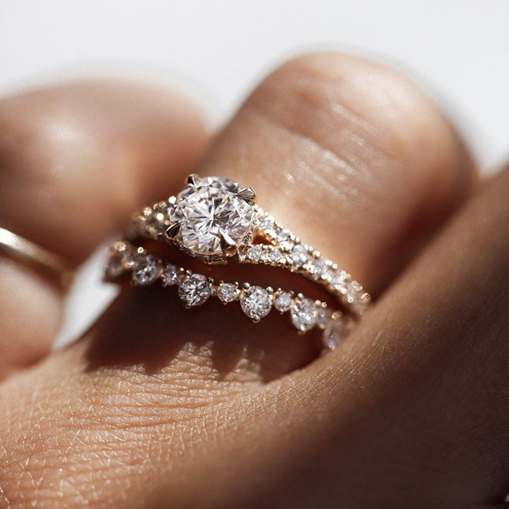 Round moissanite split shank pave engagement ring with brilliant sparkle