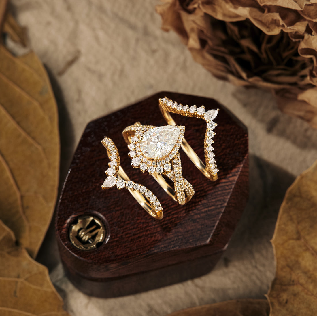 Pear shaped moissanite diamond bridal set with vintage setting