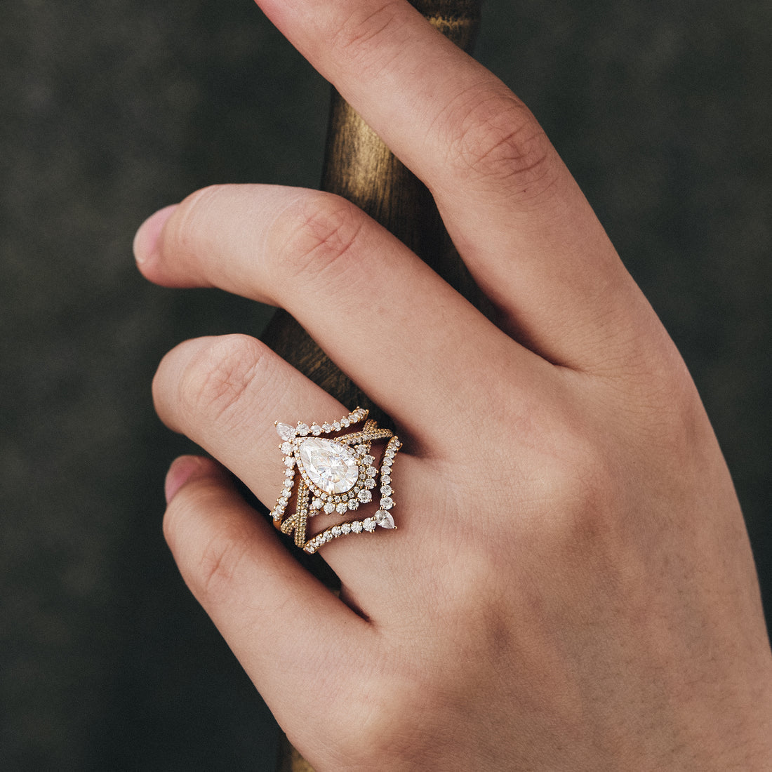 Pear shaped moissanite diamond bridal set with vintage setting