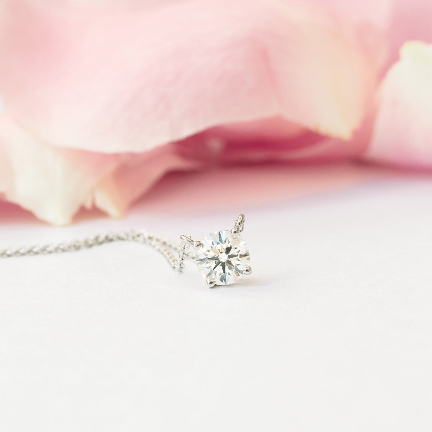 Solitaire Necklace with 1.0 CT Floating Round Cut Moissanite