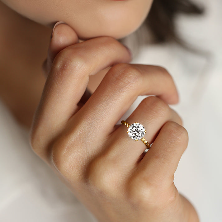 Hidden Halo Twisted Pave Ring with 1.0 CT Round Cut Moissanite