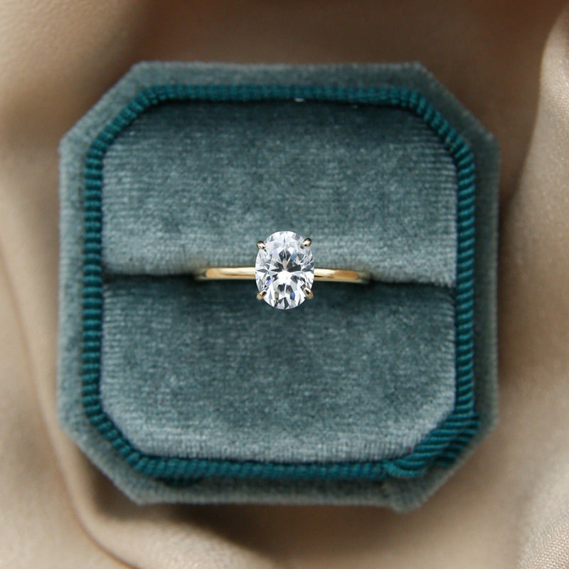 Oval cut moissanite solitaire engagement ring with timeless design