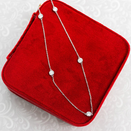 Five Bezel Necklace with 0.25 TCW Floating Cosmopolitan Round Cut Moissanite