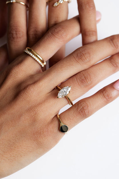 Solitaire Ring with 0.80 CT Marquise Cut Moissanite