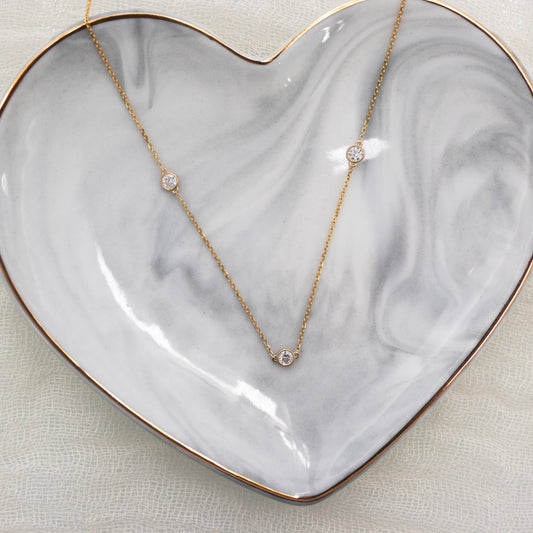 Triple Bezel Necklace with 0.50 TCW Floating Round Cut Moissanite