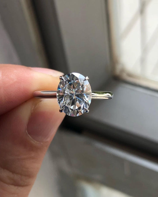 Solitaire Ring with 1.33 CT Oval Cut Moissanite