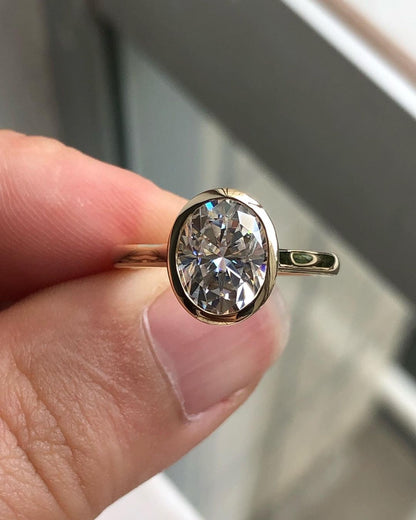Bezel Hidden Halo Ring with 1.33 CT Oval Cut Moissanite
