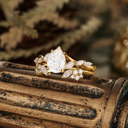 Pear moissanite diamond bridal set with twisted setting