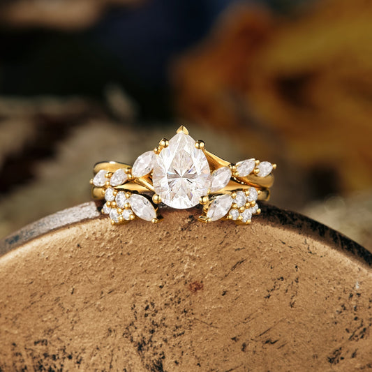 Pear moissanite diamond bridal set with twisted setting