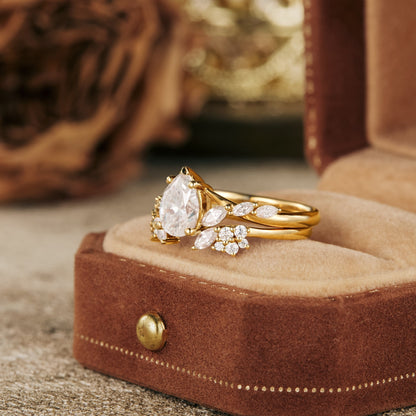 Pear moissanite diamond bridal set with twisted setting