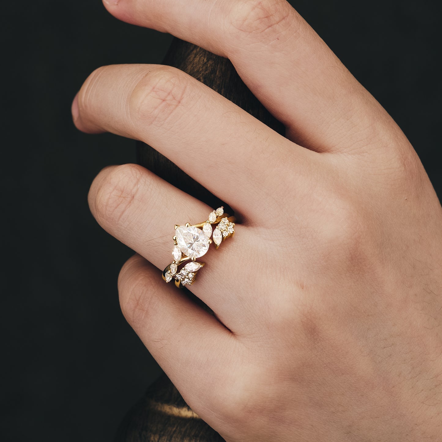 Pear moissanite diamond bridal set with twisted setting