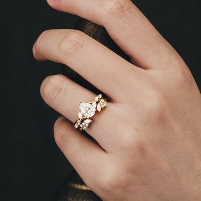 Pear moissanite diamond bridal set with twisted setting