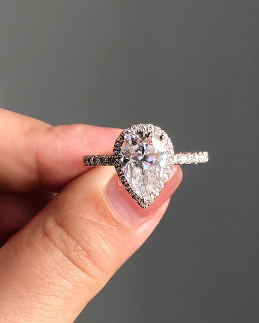 Halo & Pave Ring with 1.93 CT Pear Cut Moissanite