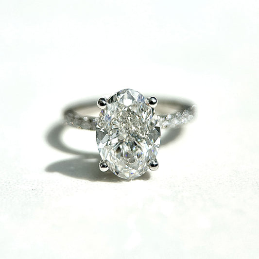 1.0–3.0 CT oval cut CVD lab grown diamond engagement ring with hidden halo, pave band, E color, VS1 clarity, in white gold setting
