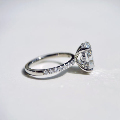 1.80 CT oval cut CVD lab grown diamond engagement ring with hidden halo, pave-set band, E color, VS1 clarity, in white gold setting