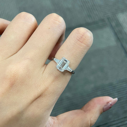Emerald cut CVD diamond three stone engagement ring