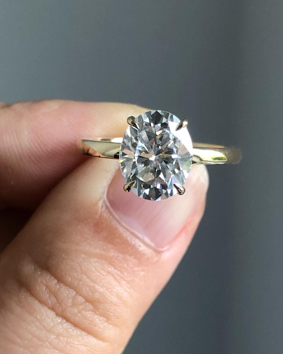 Hidden Halo Ring with 1.33 CT Oval Cut Moissanite