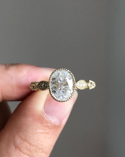 Milgrain Style Pave Ring with 1.33 CT Crushed Ice Oval Cut Moissanite