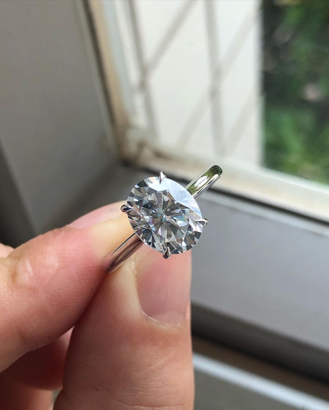 Solitaire Ring with 1.33 CT Oval Cut Moissanite