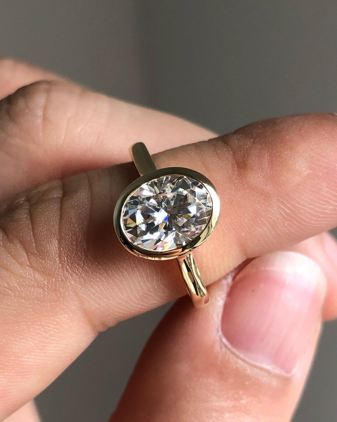 Bezel Hidden Halo Ring with 1.33 CT Oval Cut Moissanite